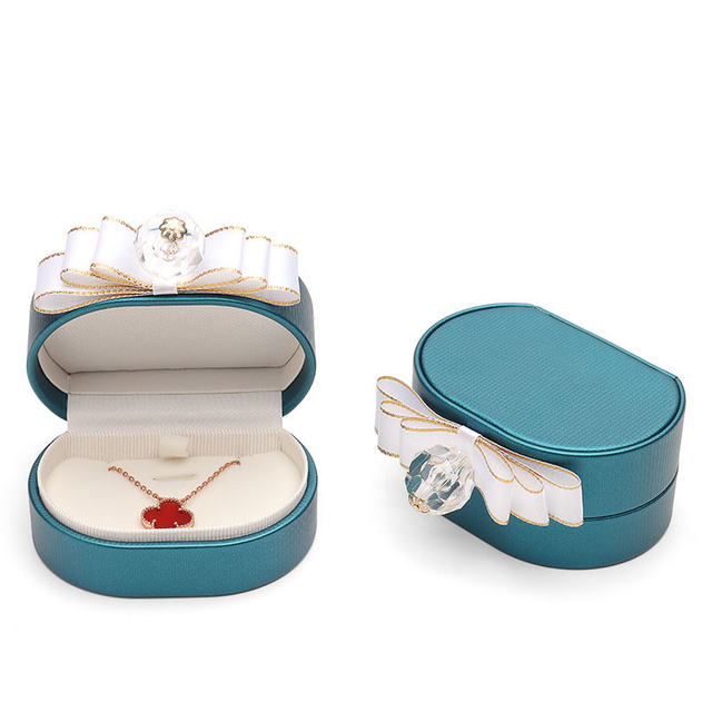 European Style Small Cute PU Leather Oval Pendant Ring Jewelry Packaging Box Manufacturers Wholesale with Bow Decoration